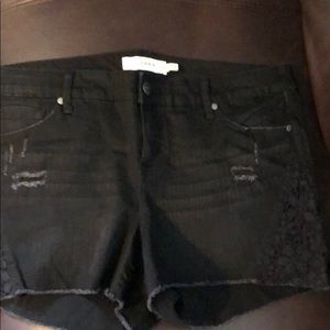 Black denim shorts